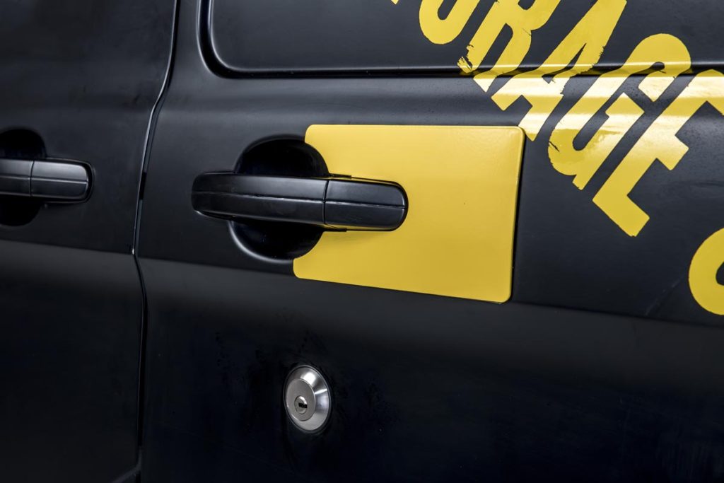 handle shield and slam lock on sliding door of van